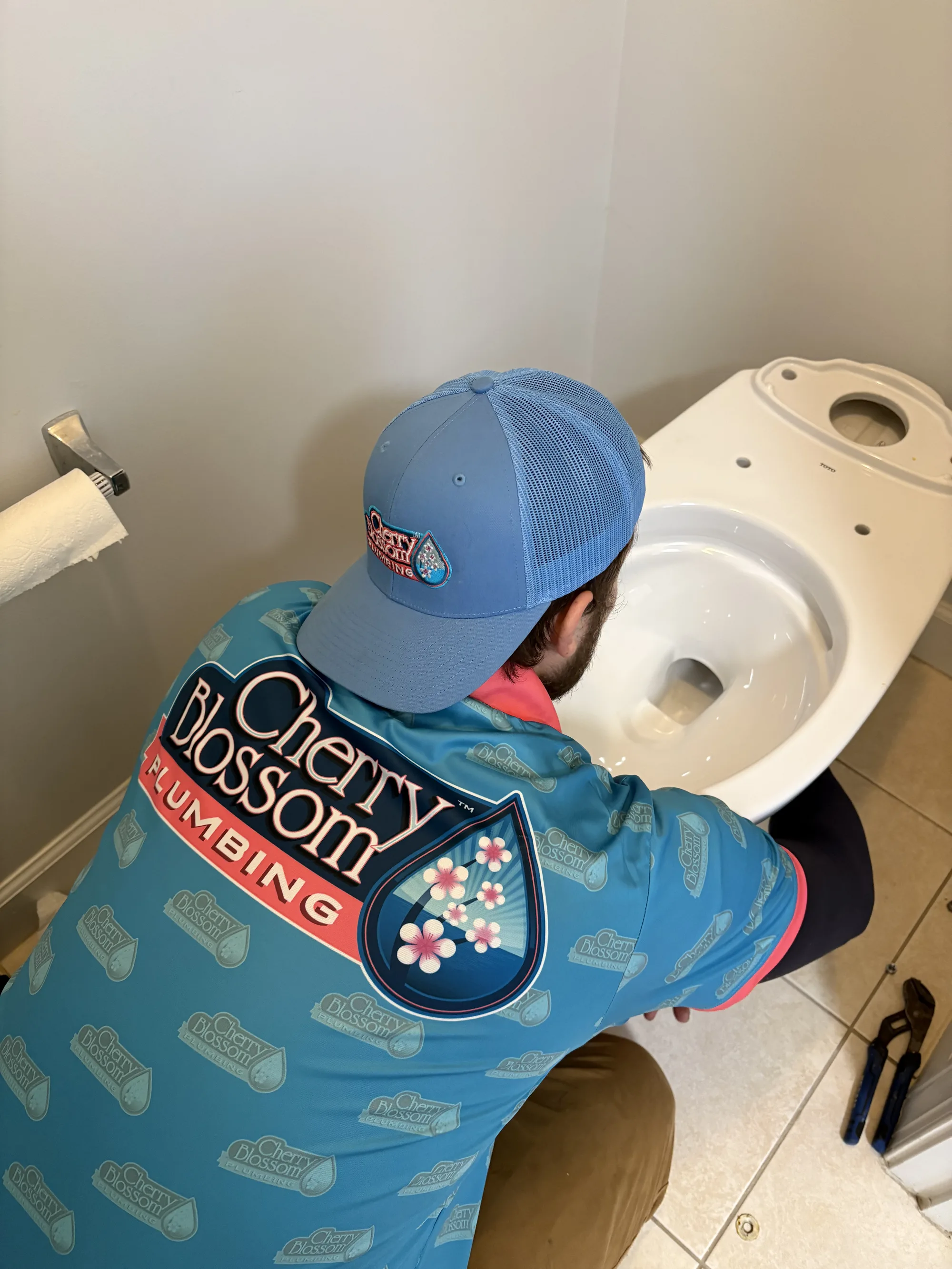 Tech Installing New Toilet