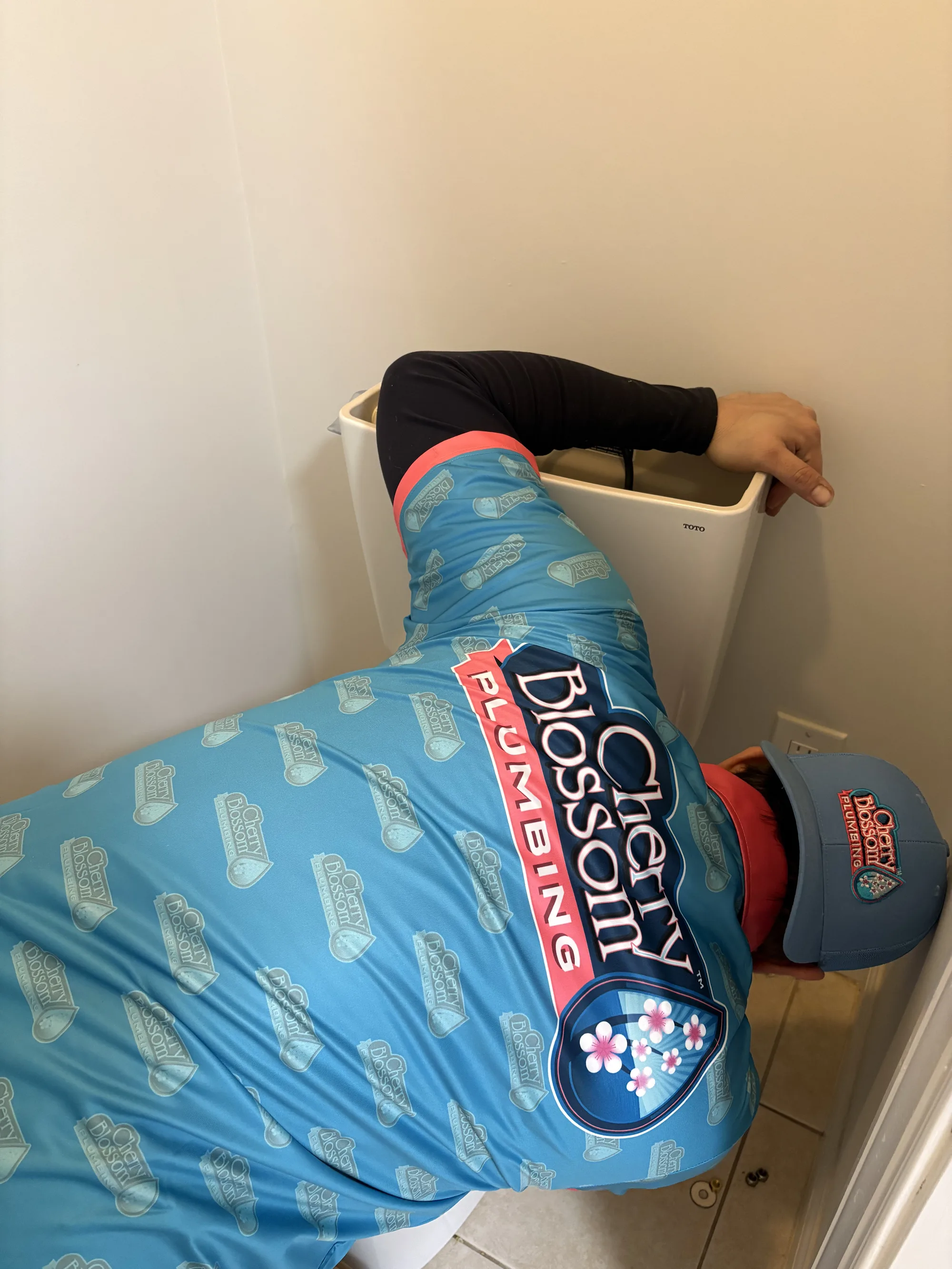 Tech Working on Toilet