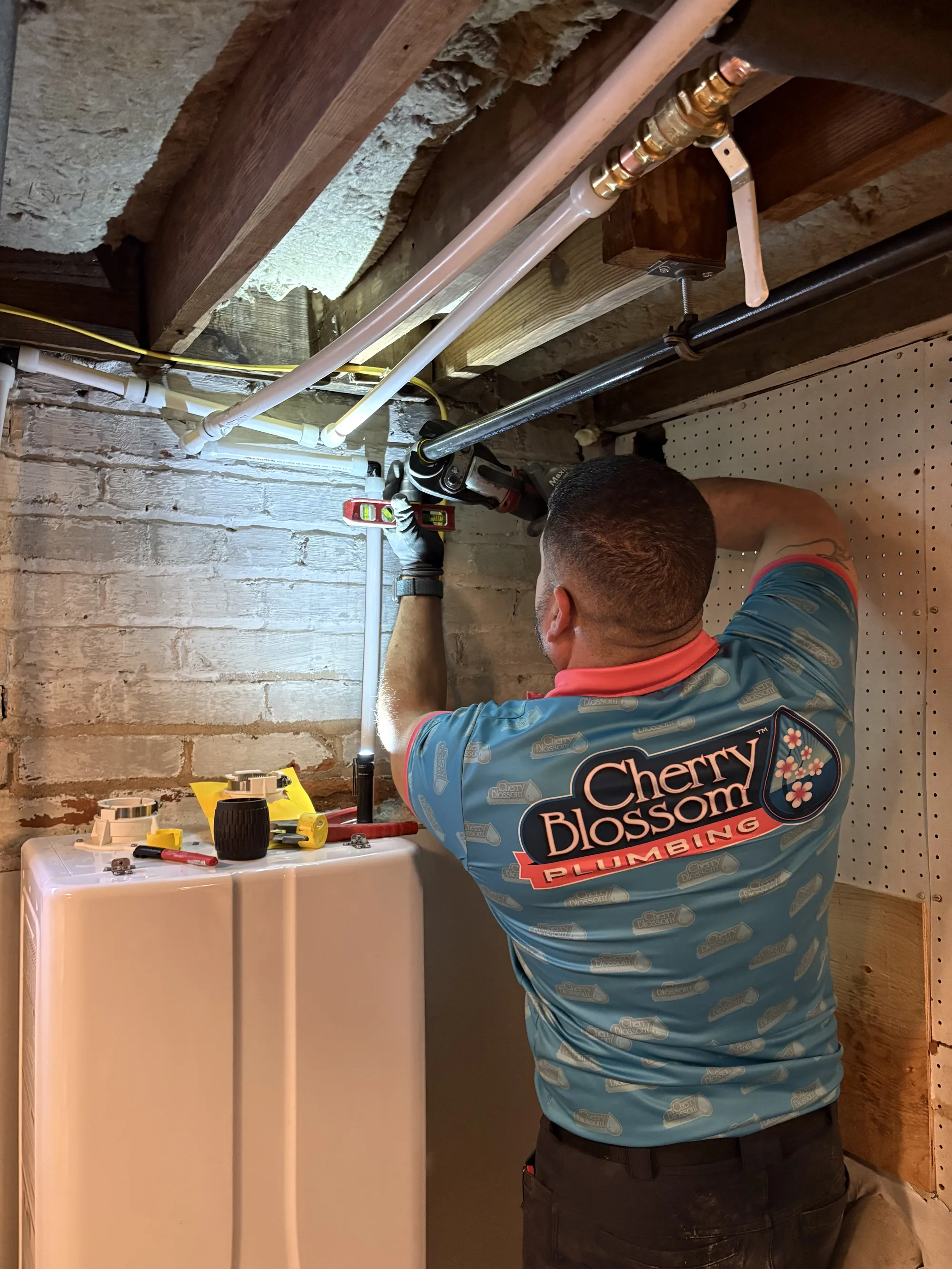 Technician Extending Gas Line