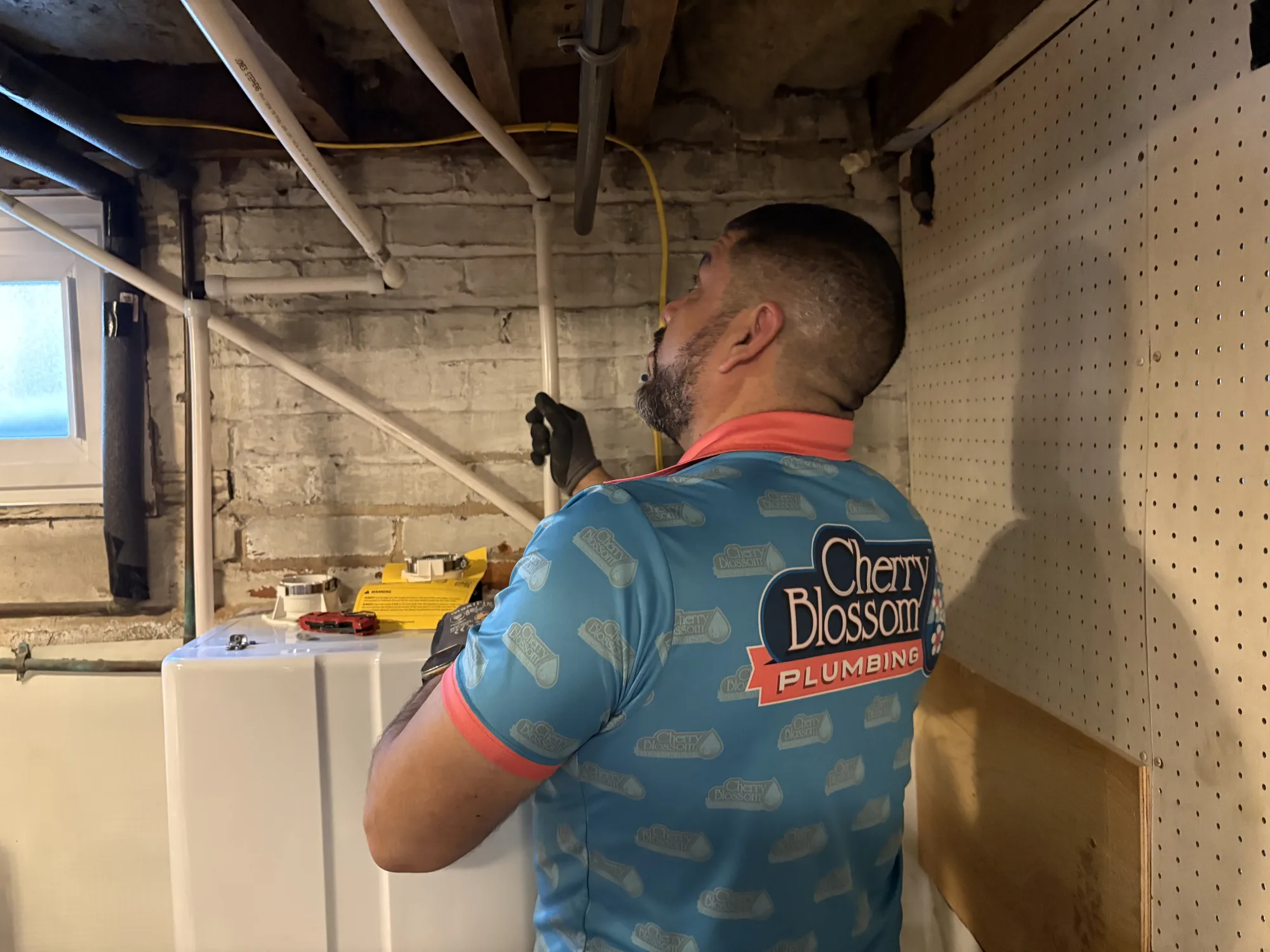 Technician Extending Piping (2)