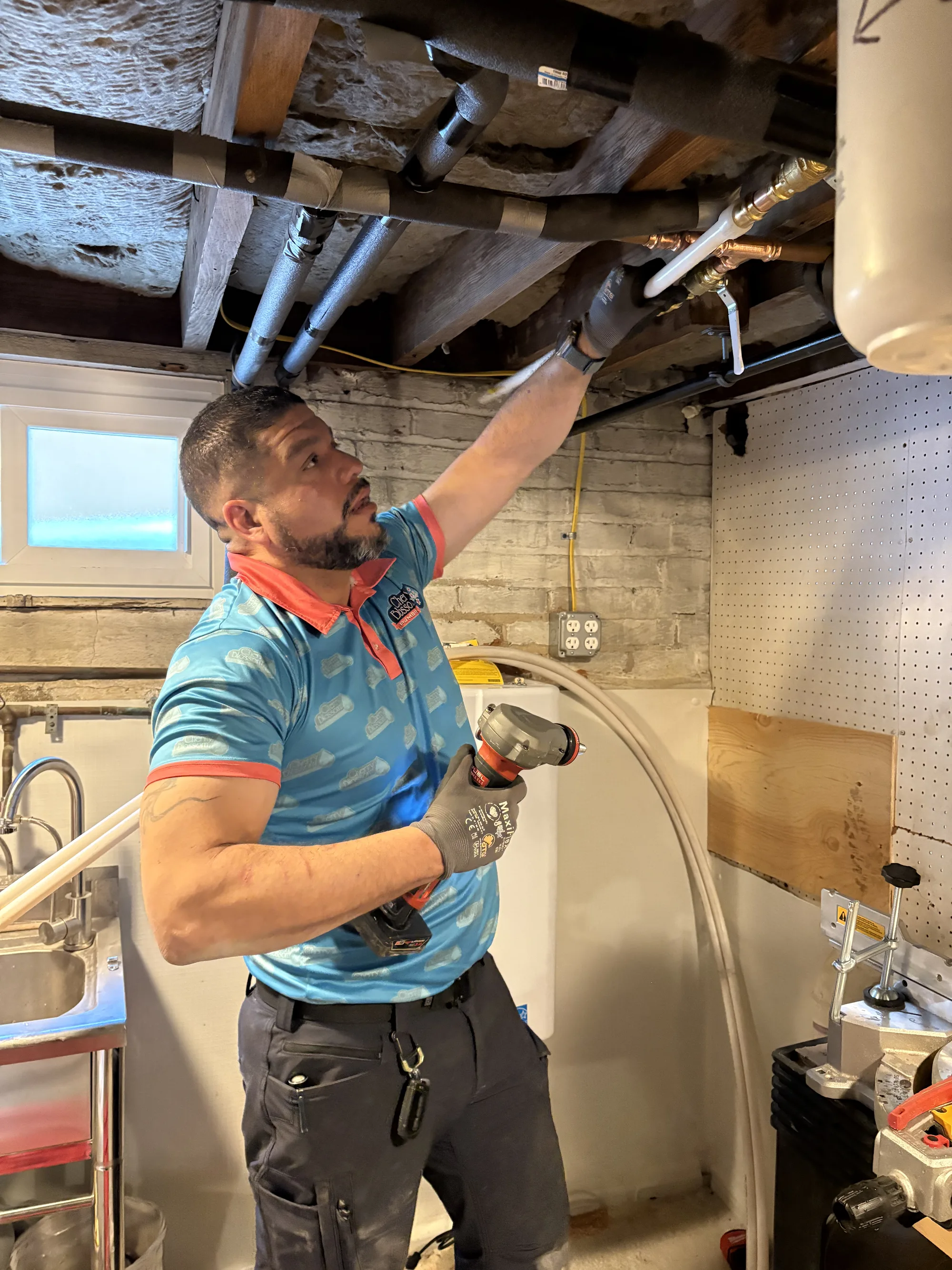 Technician Looking at Pipes (2)