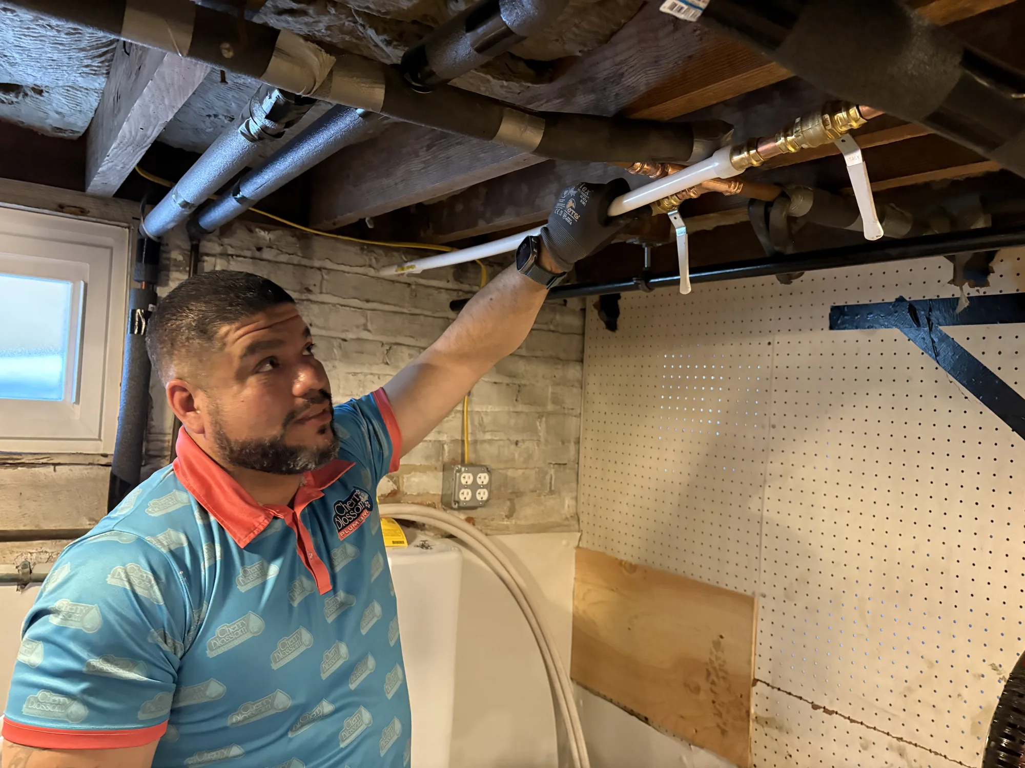 Technician Looking at Pipes (3)