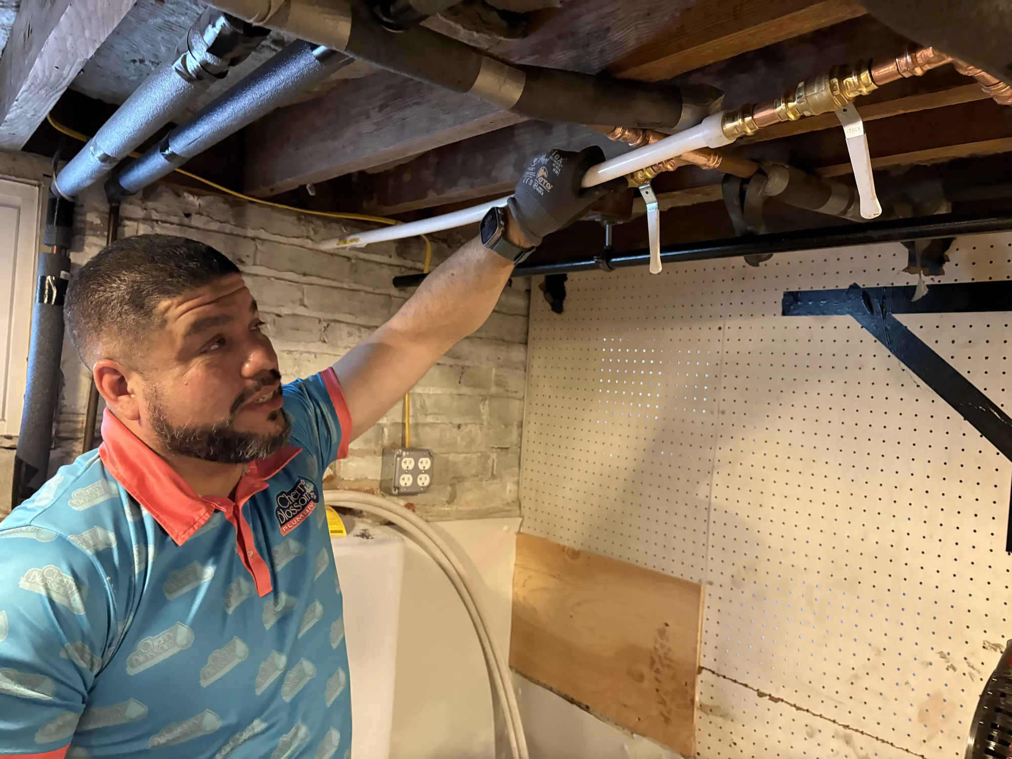 Technician Looking at Pipes (4)