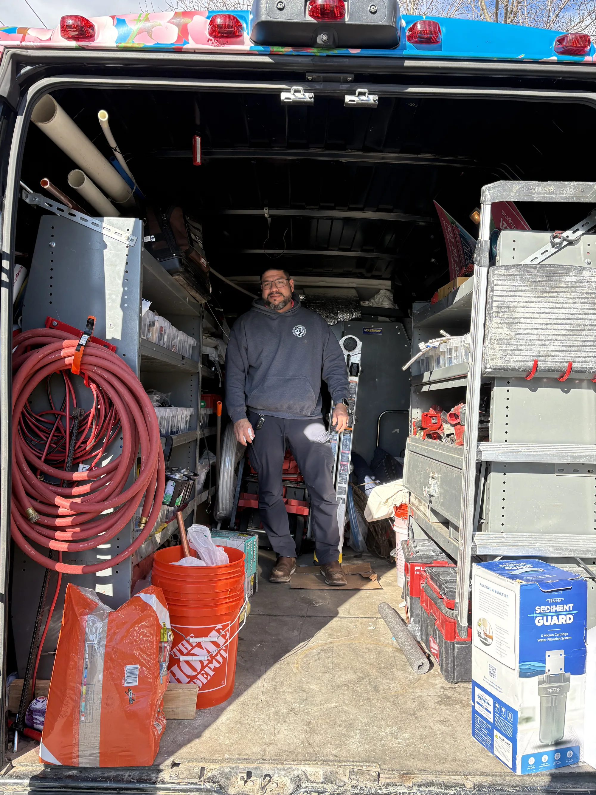 Cherry Blossom Plumbing technicians with company van