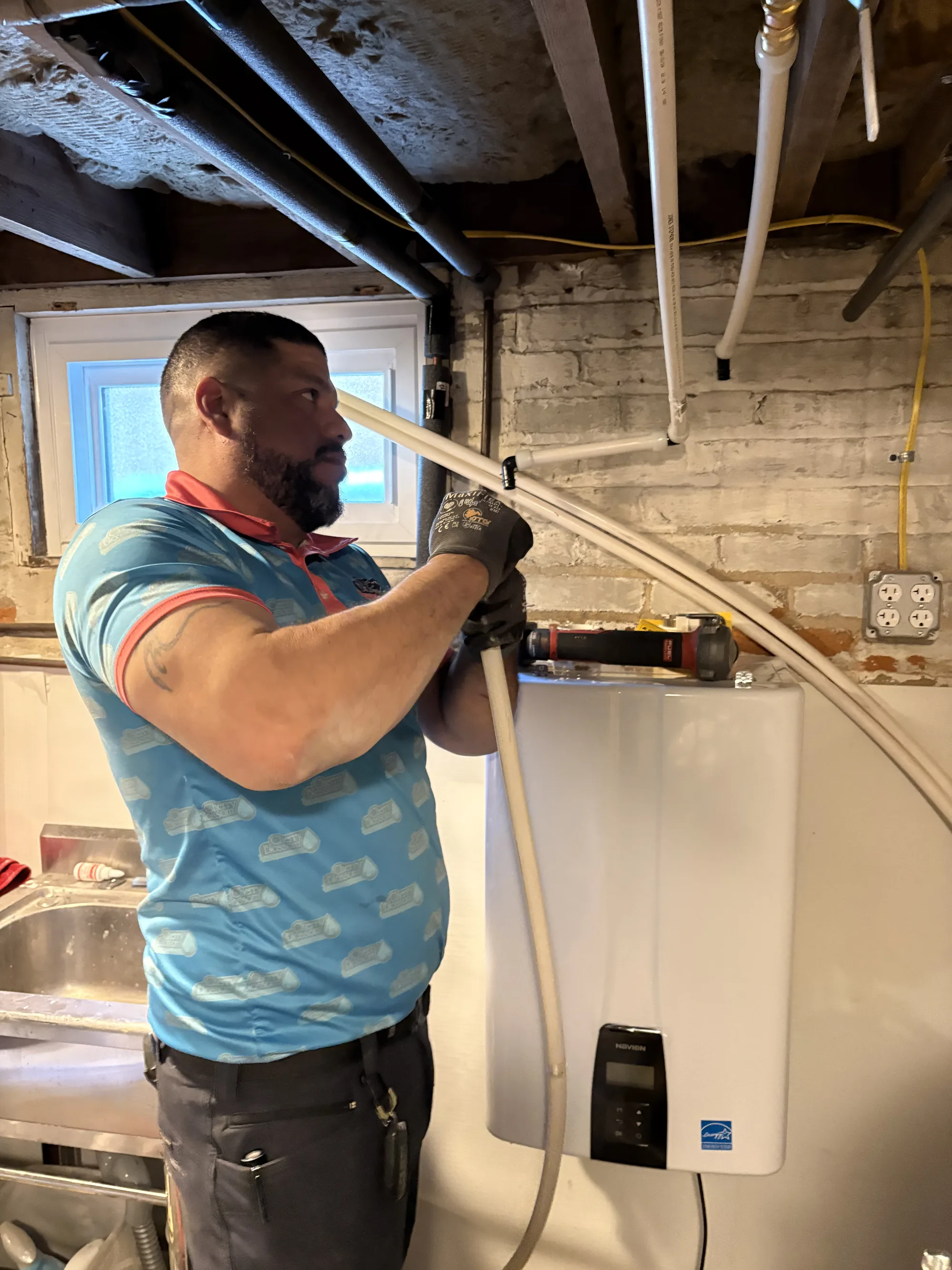 Technician Working on Pipes