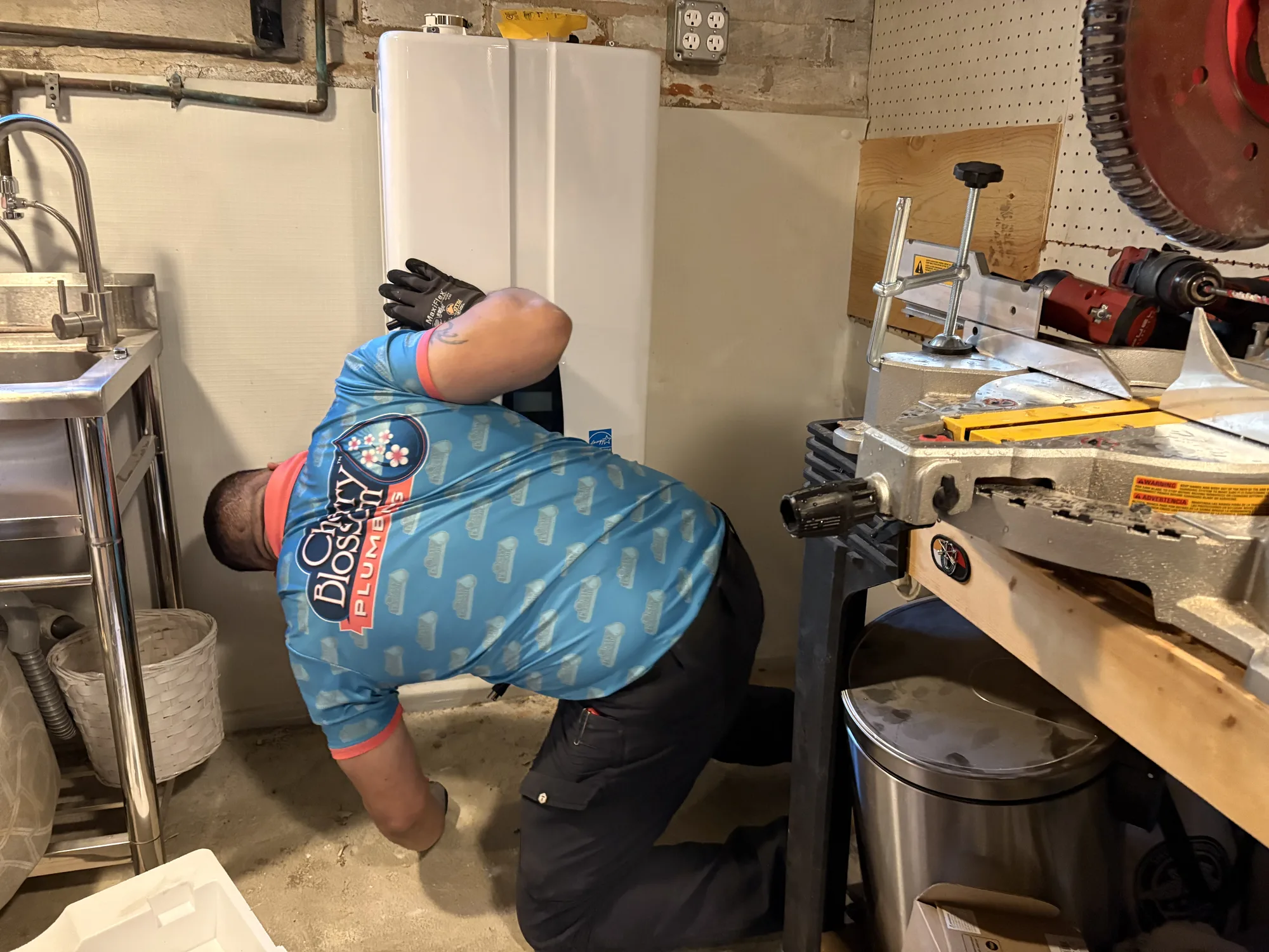Water Heater - Technician Servicing Tankless Unit