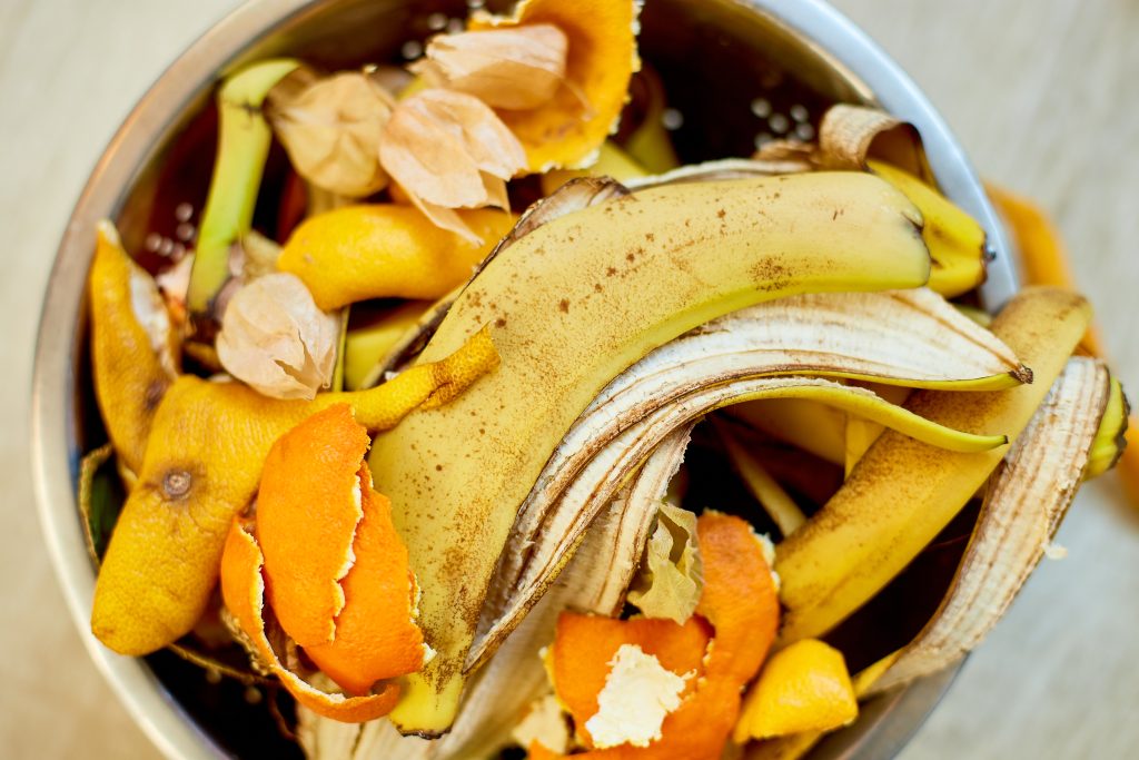 Top view of organic composting with leftover from kitchen, Recycling scraps concept